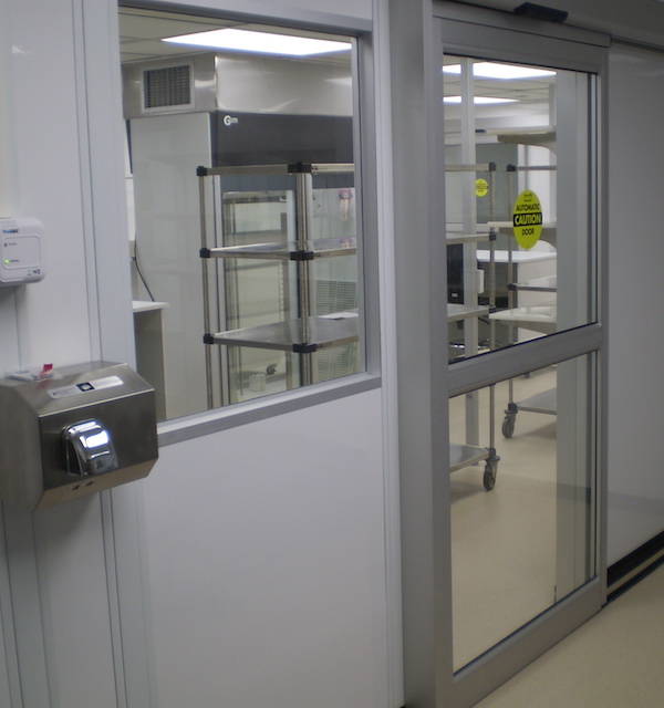 USP797 Cleanroom with auto slider doors from the anteroom to the IV compounding cleanroom.