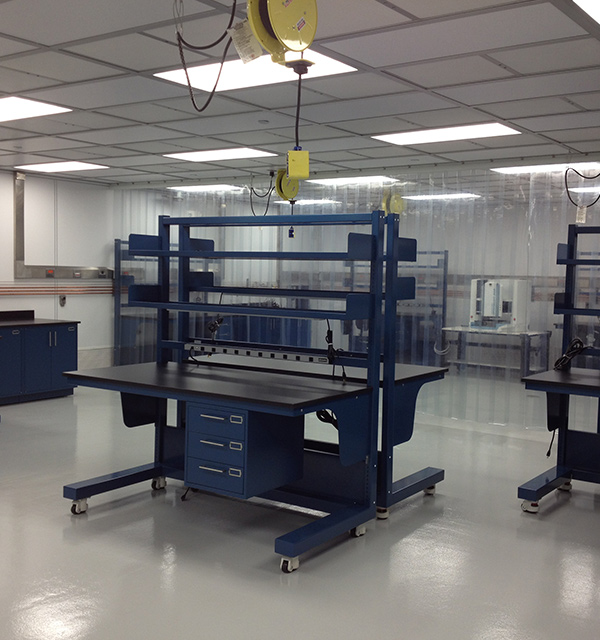 blue work station shown inside a cleanroom